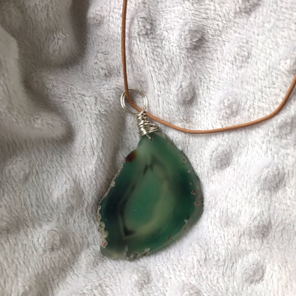 Agate slice pendant on leather cord
